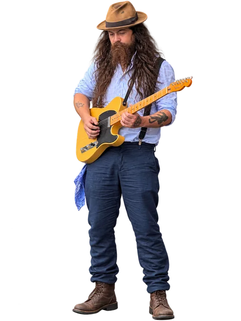 Josh McNally, The Preacher, playing his yellow electric guitar